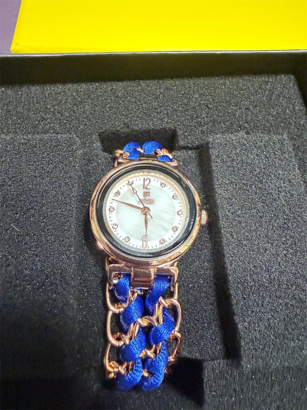 INVICTA WATCH WITH BLUE RIBBON WOVEN THROUGH BRACELET